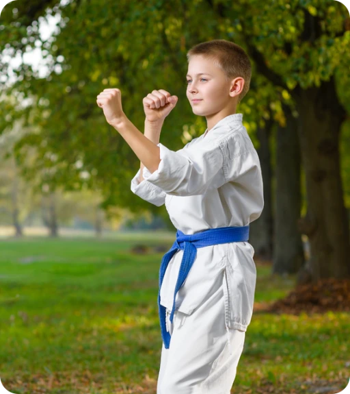 A boy with a blue belt.