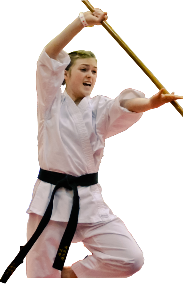 Woman with a black belt and a stick.